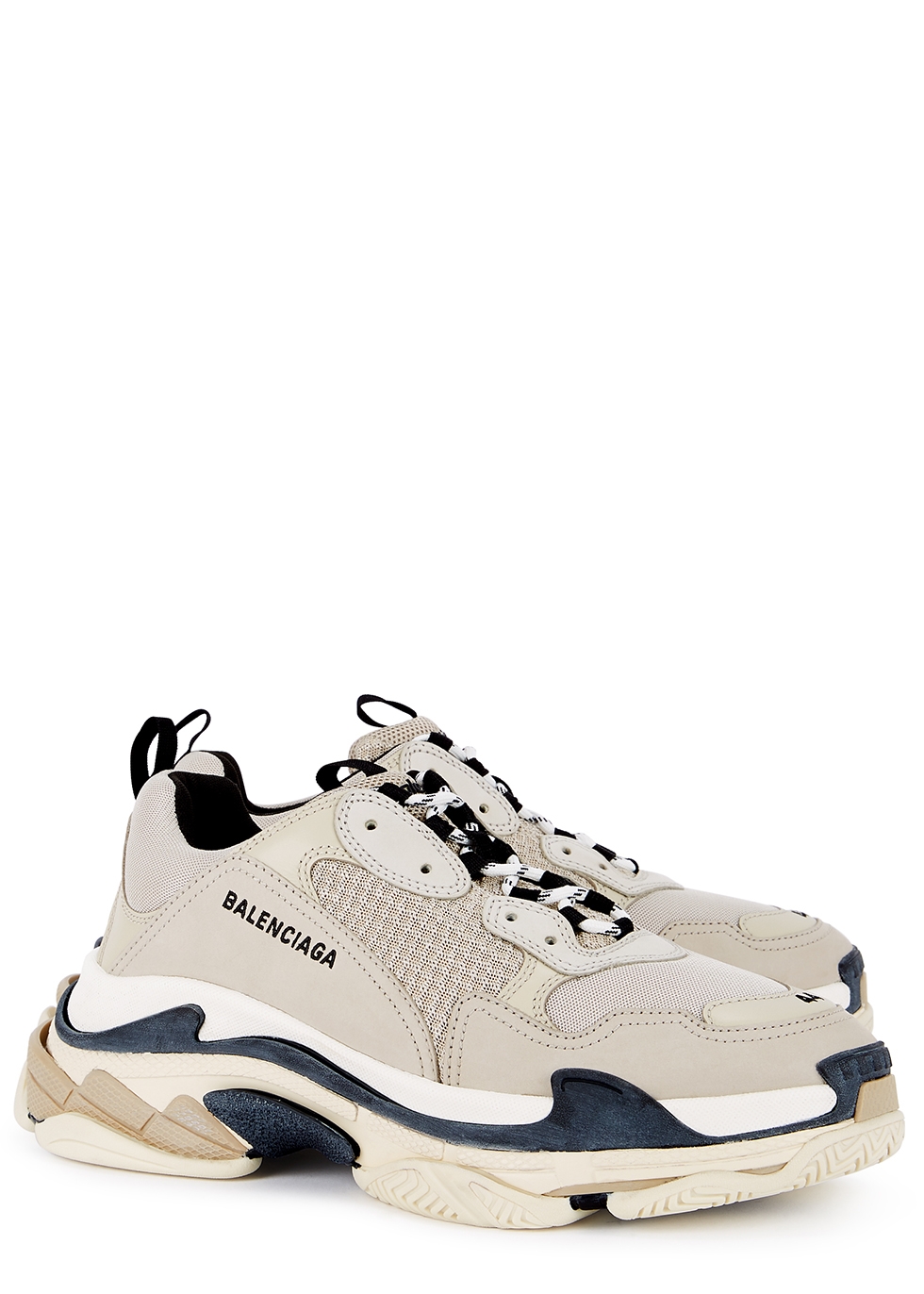 The pair of white sneakers Balenciaga triple S on the account